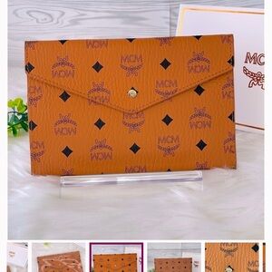 MCM Visetos Envelope Clutch Cognac RARE NEW
